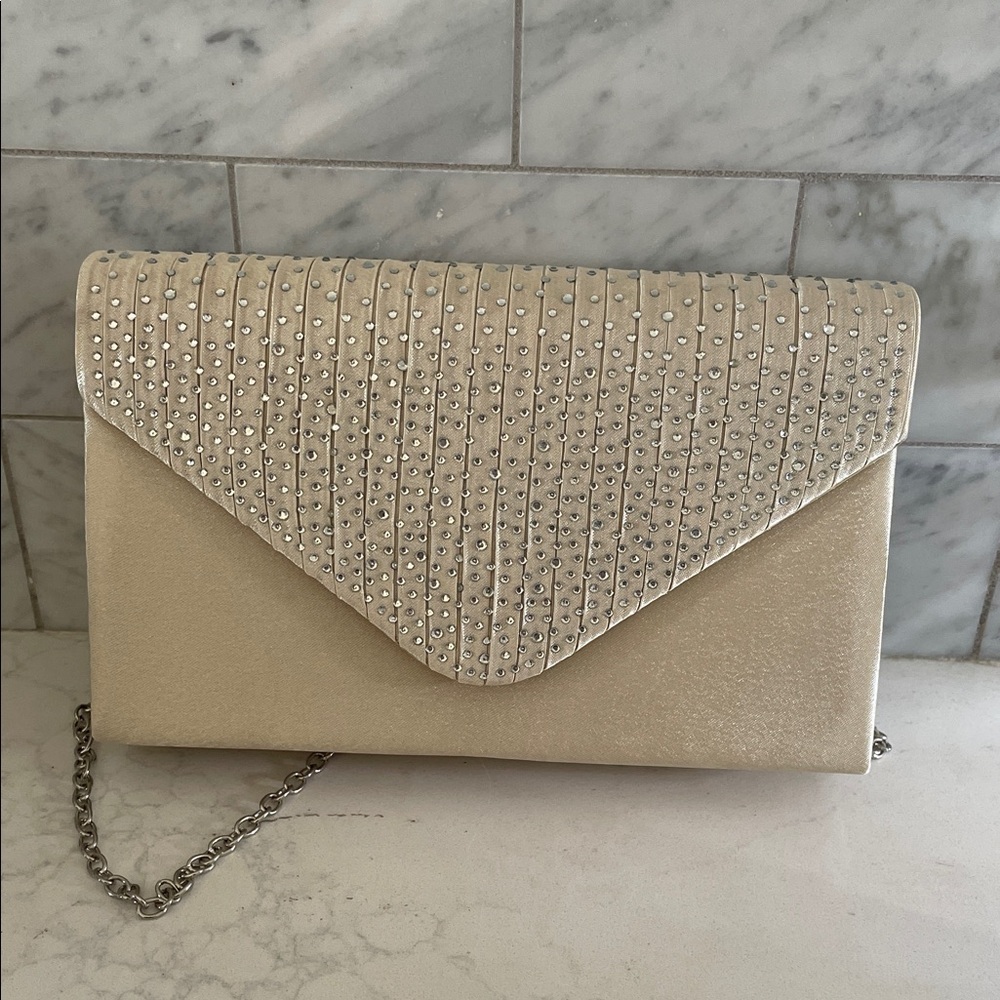 Elegant Cream Clutch with Silver Accents